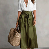 Vera – Two-piece set: black top and olive green midi skirt
